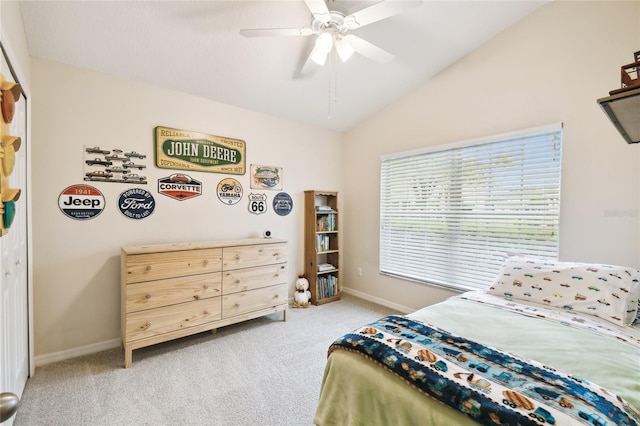 bedroom with baseboards, lofted ceiling, light colored carpet, and ceiling fan