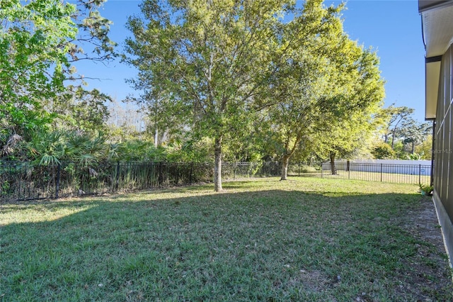 view of yard with a fenced backyard