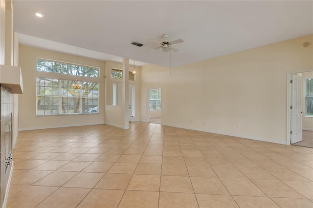 1187 Tadsworth Ter, Lake Mary, FL 32746 - interior space featuring light tile patterned floors, visible vents, baseboards, and ceiling fan with notable chandelier