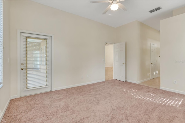 1187 Tadsworth Ter, Lake Mary, FL 32746 - spare room with visible vents, light carpet, baseboards, and a ceiling fan