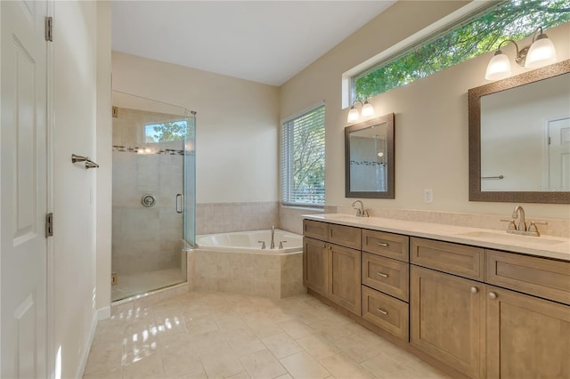 1187 Tadsworth Ter, Lake Mary, FL 32746 - full bath featuring a garden tub, a sink, a shower stall, tile patterned flooring, and double vanity