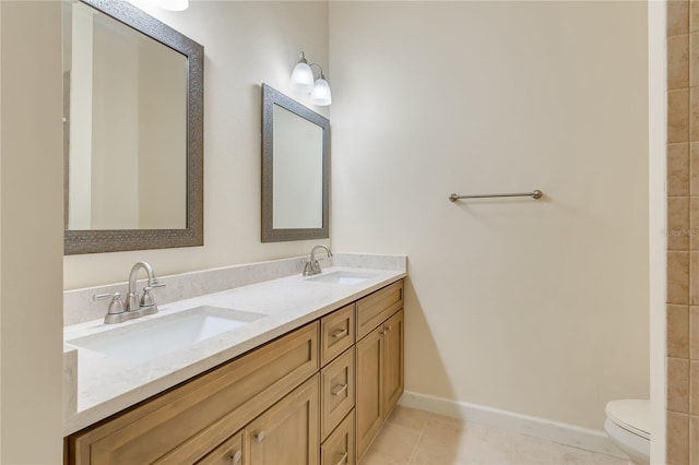 1187 Tadsworth Ter, Lake Mary, FL 32746 - full bath featuring tile patterned flooring, double vanity, baseboards, and a sink