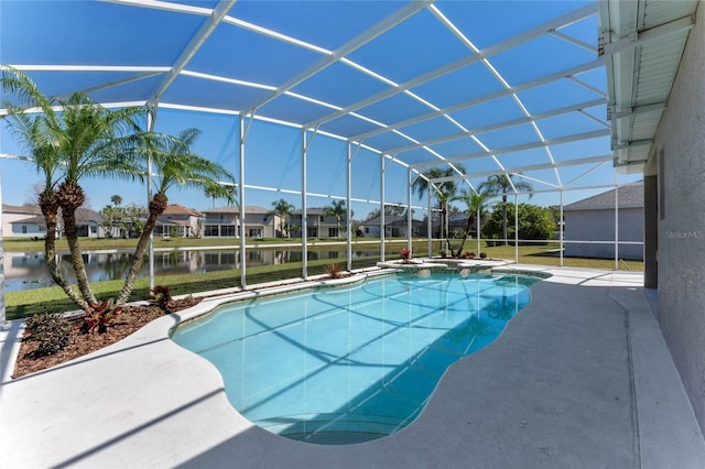 pool featuring a water view, a residential view, glass enclosure, a patio area, and an in ground hot tub