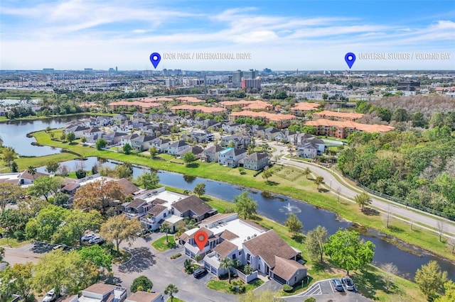 bird's eye view with a residential view and a water view