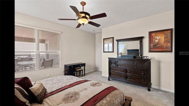 bedroom featuring carpet flooring, baseboards, and ceiling fan