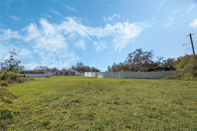 view of yard with fence