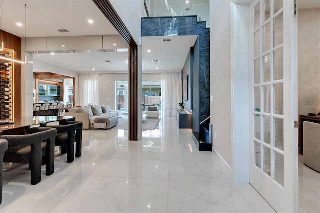 interior space featuring recessed lighting, visible vents, and marble finish floor