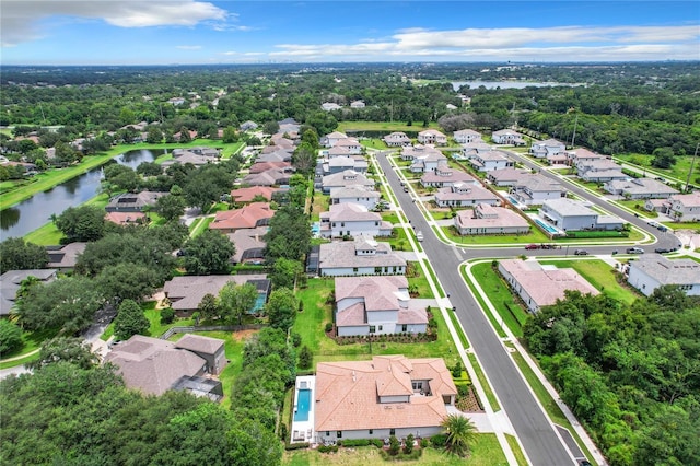 aerial view featuring a residential view and a water view