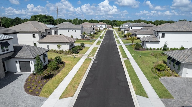 view of street featuring a residential view and sidewalks