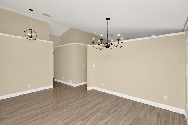 interior space featuring light wood-style floors, visible vents, baseboards, and a notable chandelier