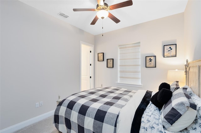 bedroom featuring carpet flooring, baseboards, visible vents, and ceiling fan