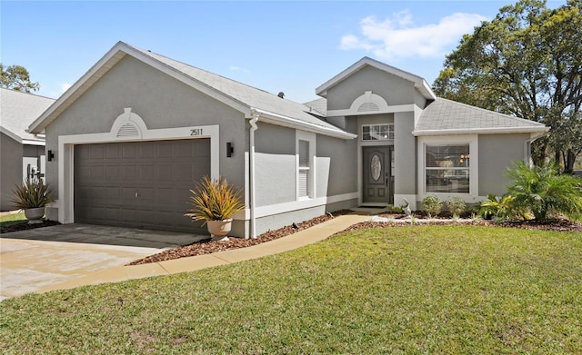 single story home featuring concrete driveway, an attached garage, a front lawn, and stucco siding