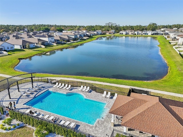 aerial view with a water view and a residential view