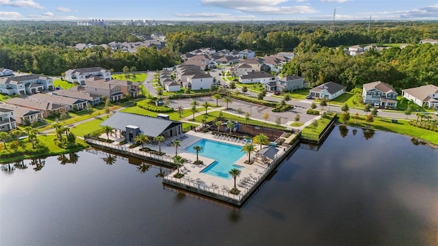 aerial view with a residential view and a water view