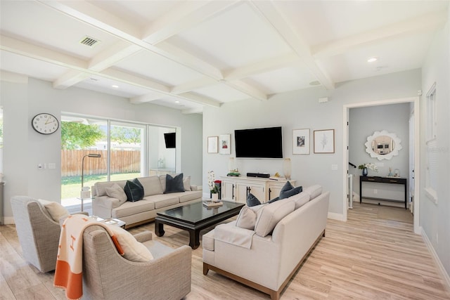 living room featuring visible vents, coffered ceiling, beamed ceiling, and light wood finished floors