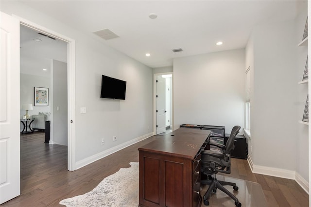 office with visible vents, recessed lighting, dark wood-type flooring, and baseboards