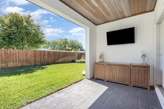 view of yard featuring a patio and a fenced backyard