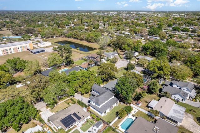 birds eye view of property featuring a residential view and a water view