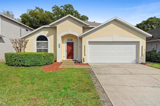 ranch-style home with a front lawn, an attached garage, driveway, and stucco siding