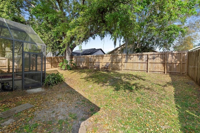 view of yard featuring a fenced backyard