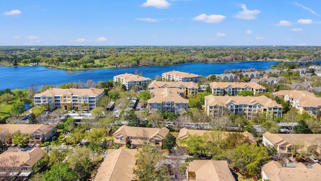 birds eye view of property with a residential view and a water view