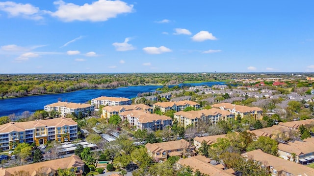 birds eye view of property featuring a residential view and a water view