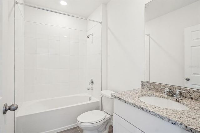 bathroom featuring toilet, vanity, and shower / bathtub combination