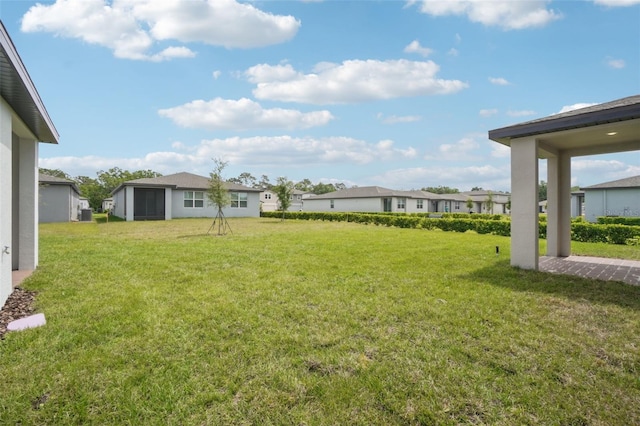 view of yard featuring a residential view