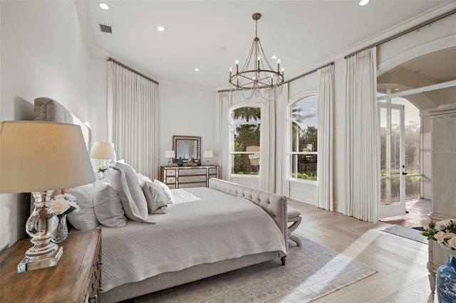 bedroom with a notable chandelier, recessed lighting, visible vents, and ornamental molding