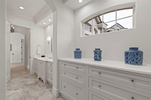 bathroom featuring vanity and recessed lighting