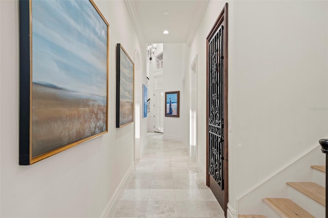 hall with stairway, recessed lighting, baseboards, and ornamental molding