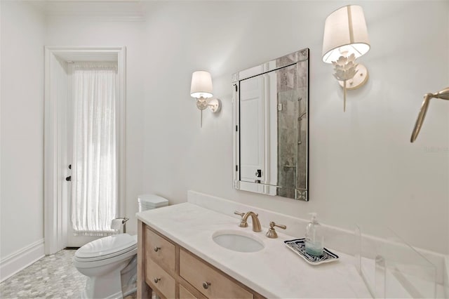 bathroom with toilet and vanity