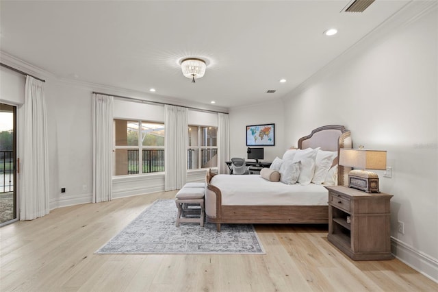 bedroom featuring recessed lighting, wood finished floors, baseboards, and ornamental molding