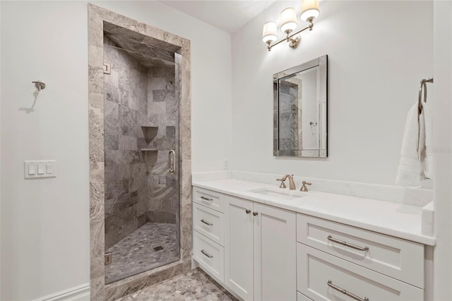 full bathroom with vanity and a stall shower