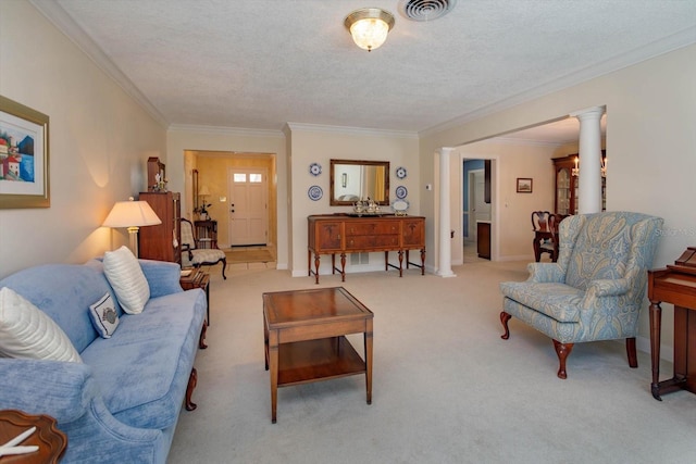 living room with visible vents, ornamental molding, carpet floors, a textured ceiling, and ornate columns