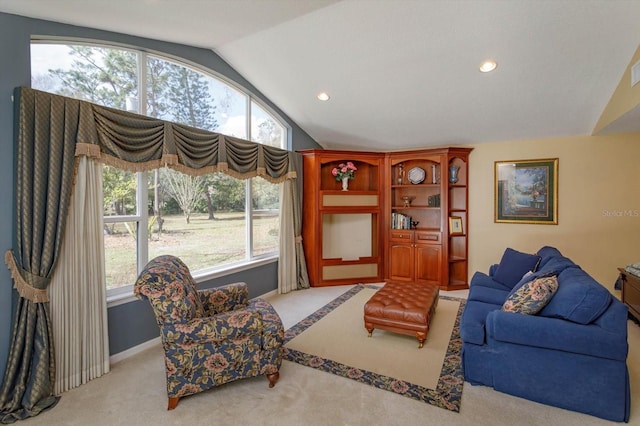 living area with recessed lighting, baseboards, lofted ceiling, and carpet floors