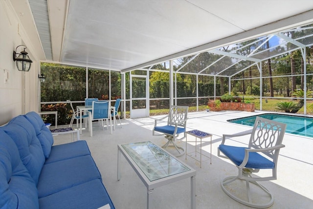 exterior space featuring an outdoor pool, an outdoor living space, and glass enclosure