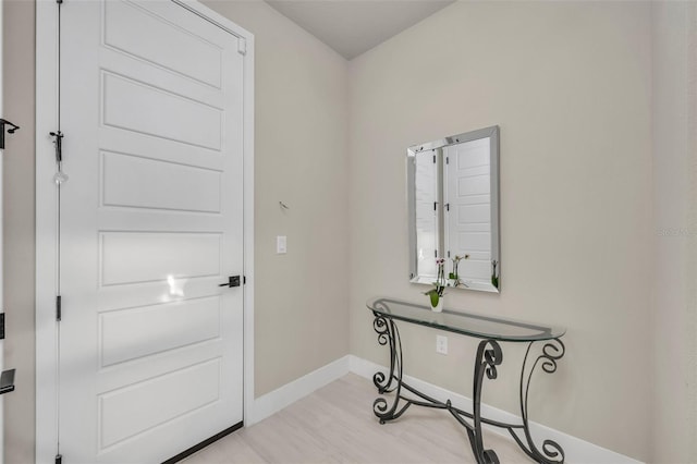 entryway featuring baseboards