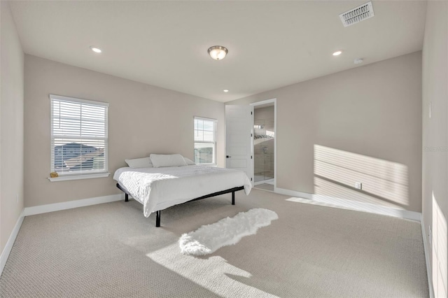 bedroom with recessed lighting, baseboards, visible vents, and carpet floors