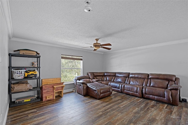 living area with a ceiling fan, a textured ceiling, wood finished floors, and ornamental molding