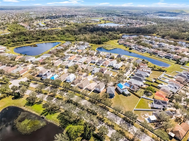 aerial view featuring a residential view and a water view