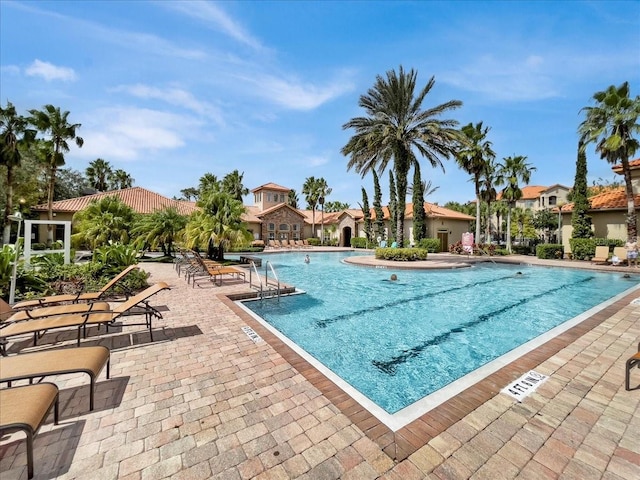 pool with a patio area