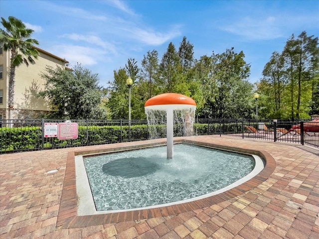 view of pool with fence