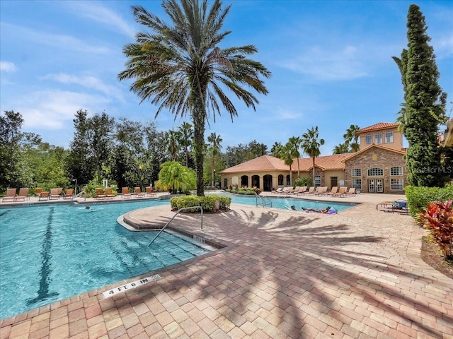 pool with a patio area