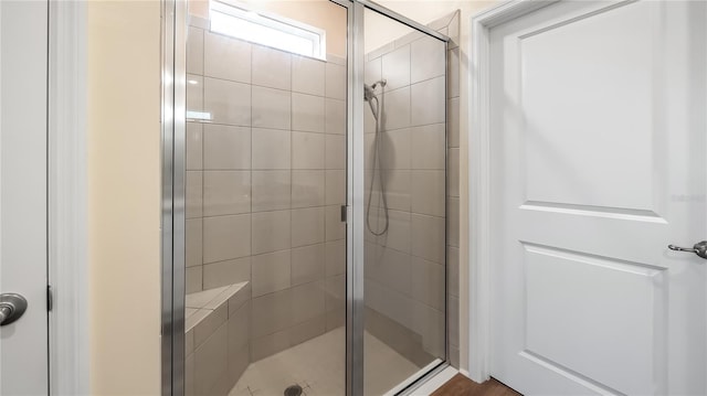 full bathroom featuring a shower stall