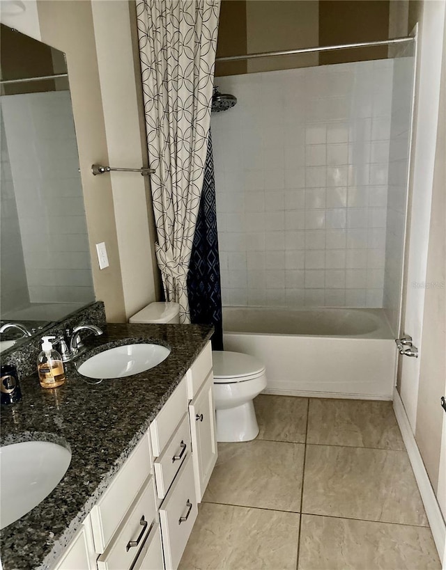 full bathroom with a sink, toilet, shower / bath combo, and tile patterned flooring