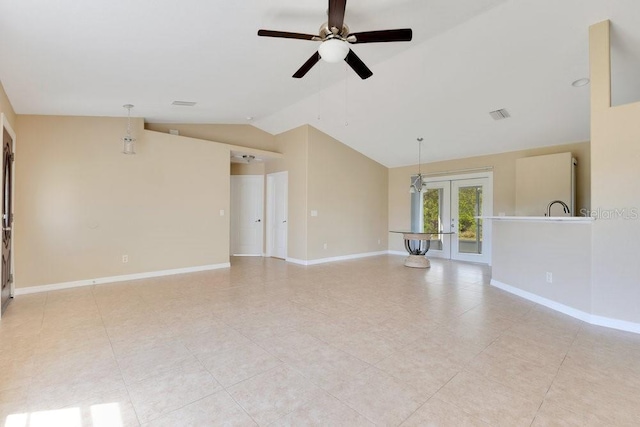 unfurnished living room with french doors, baseboards, visible vents, and vaulted ceiling