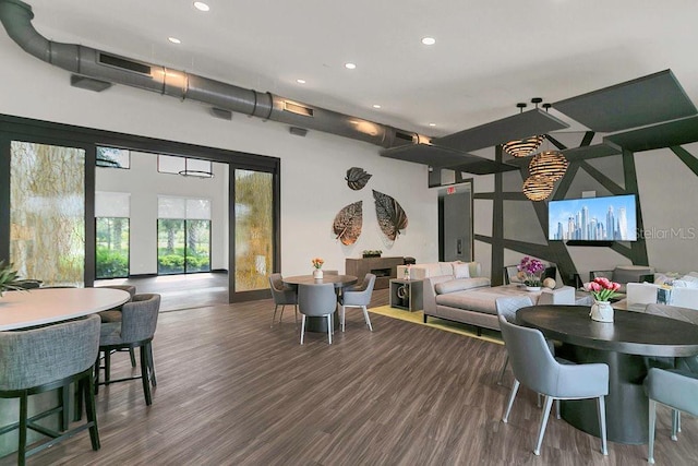 interior space featuring recessed lighting and wood finished floors