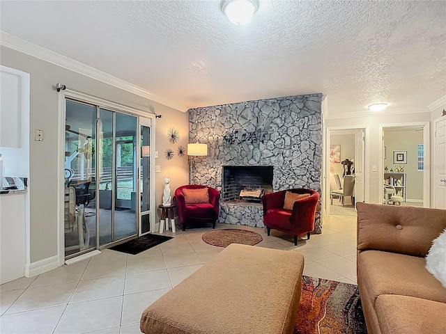 living area featuring light tile patterned flooring, a fireplace, a textured ceiling, and crown molding