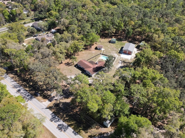 bird's eye view featuring a view of trees